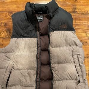 North face vest Worn twice. Rust and black. Size large fits true to size